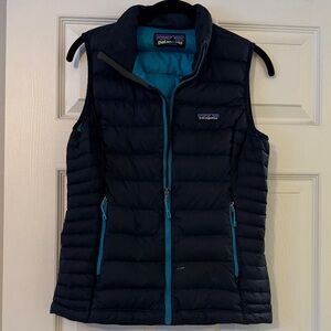Patagonia Women's Navy Puffer Vest with Teal Accents